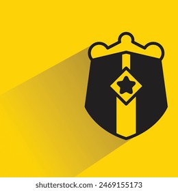 shield badge with shadow on yellow background