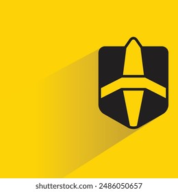 shield badge with shadow on yellow background