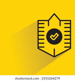 shield badge with shadow on yellow background