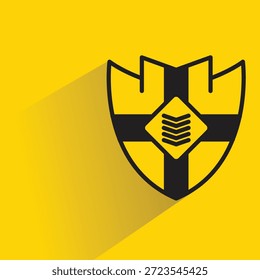 shield badge symbol with shadow on yellow background