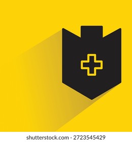 shield badge symbol with shadow on yellow background