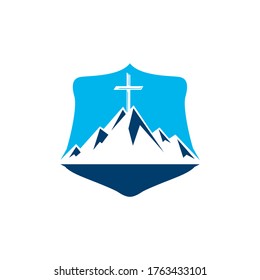 Shield Baptist cross in mountain logo design. Cross on top of the mountain.