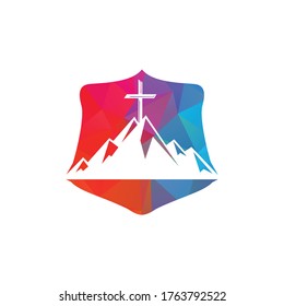 Shield Baptist cross in mountain logo design. Cross on top of the mountain.