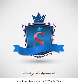 Shield with blue ribbon.