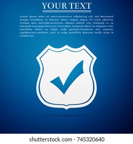 Shield with check mark icon isolated on blue background. Flat design. Vector Illustration