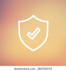 Shield with check mark icon thin line for web and mobile, modern minimalistic flat design. Vector white icon on gradient mesh background.