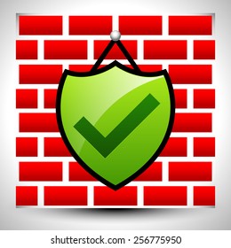 Shield with check-mark hanging on brick wall for IT or home security - Firewall, antivirus, cyber security
