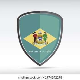 Shield icon with Delaware State Flag on gray bacground. Vector illustration.