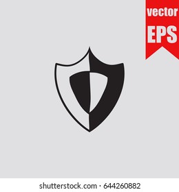 Shield icon hand drawn doodle sketch isolated on grey background. Vector illustration.