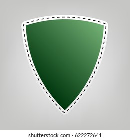 Shield icon illustration. Vector. Green icon with outline for cutting out at gray background.