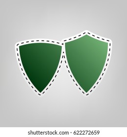 Shield icon illustration. Vector. Green icon with outline for cutting out at gray background.