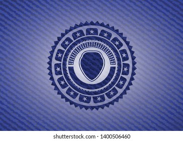 shield icon inside badge with jean texture