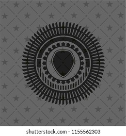shield icon inside black emblem