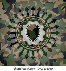 shield icon inside camouflage emblem