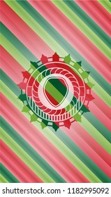 shield icon inside christmas colors badge.