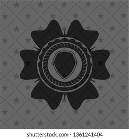 shield icon inside dark emblem
