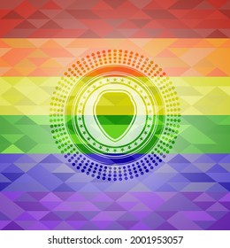 shield icon inside emblem on mosaic background with the colors of the LGBT flag. 
