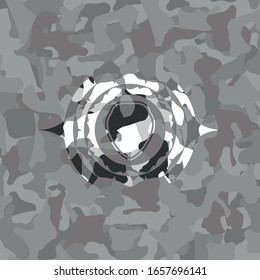shield icon inside grey camouflage texture