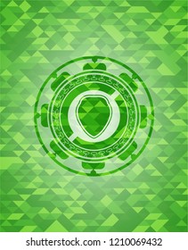 shield icon inside realistic green emblem. Mosaic background