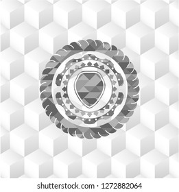 shield icon inside realistic grey emblem with cube white background