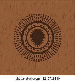 shield icon inside realistic wood emblem