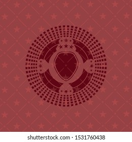 shield icon inside red emblem