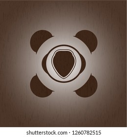 shield icon inside retro style wooden emblem