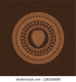shield icon inside retro style wood emblem