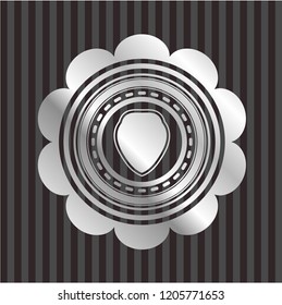 shield icon inside silver badge or emblem