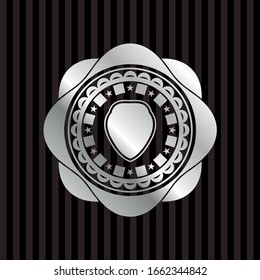 shield icon inside silver shiny badge