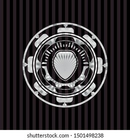 shield icon inside silvery badge