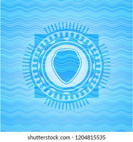 shield icon inside water concept badge.