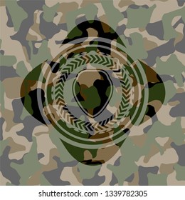 shield icon on camo pattern