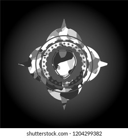 shield icon on grey camouflaged texture