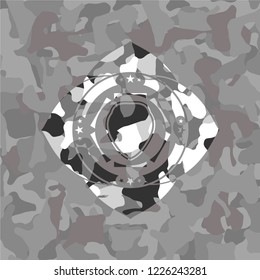 shield icon on grey camouflaged texture
