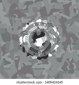 shield icon on grey camouflaged texture