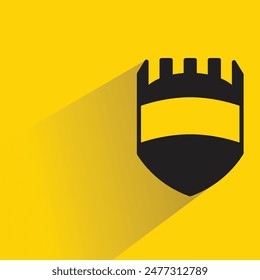 Schildsymbol mit Schatten auf gelbem Hintergrund