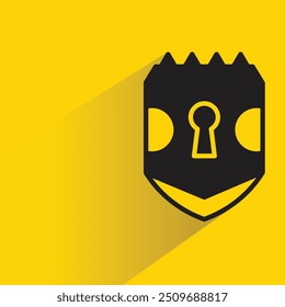 Icono de escudo con sombra sobre fondo amarillo