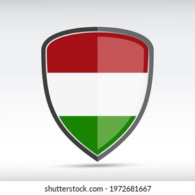 Shield icon with state flag of Hungary country on gray bacground. Vector illustration.