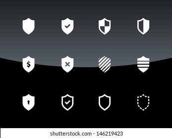 Shield icons on black background. Vector illustration.