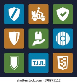 shield icons set. Set of 9 shield filled icons such as courier on motorcycle, TIR, cargo protection, etc. 