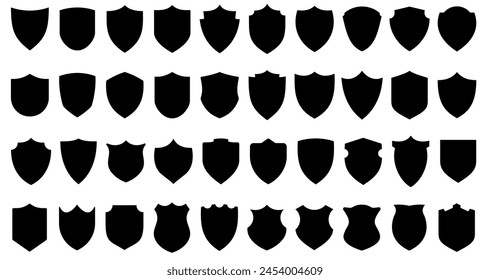 Shield icons set. Black shields of different shapes in flat graphic design. Vector illustration