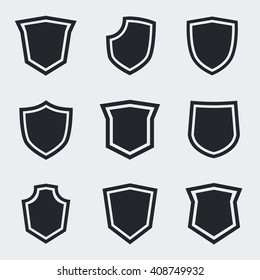 Shield icons. Vector black shields set. Flat design style. Vector illustration.