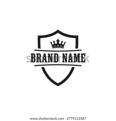 Shield logo with crown and text