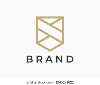 Shield logo design concept. Luxury and elegant style.