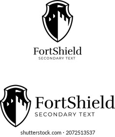 shield logo with fortress inside