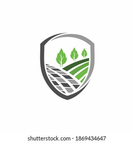 shield logo with landscape concept