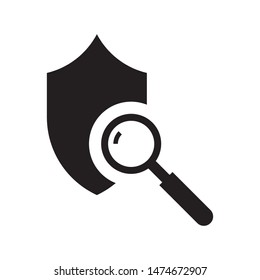 Shield with magnifying glass logo template vector icon design
