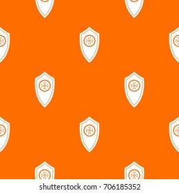 Shield pattern repeat seamless in orange color for any design. Vector geometric illustration