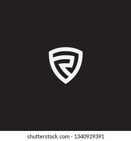 shield R logo. black and white design.